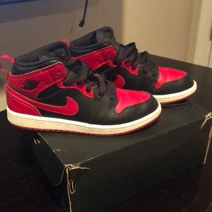 Red and black classic Jordan’s 2Y